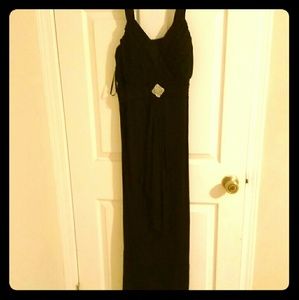 B. Smart black knee length dress.